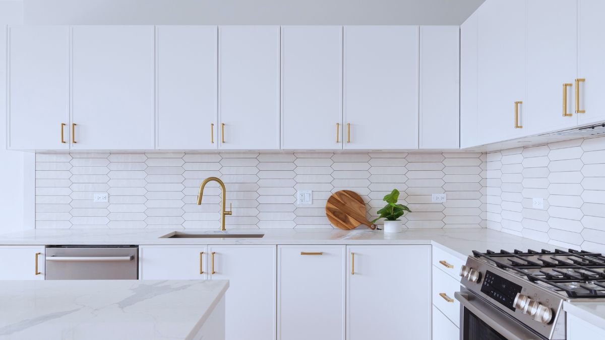 home design trends 2026, outdated home décor trends, interior design trends to avoid, all-white kitchen trend, modern farmhouse 2026, maximalist décor, color trends for homes 2026, interior design experts, home décor ideas